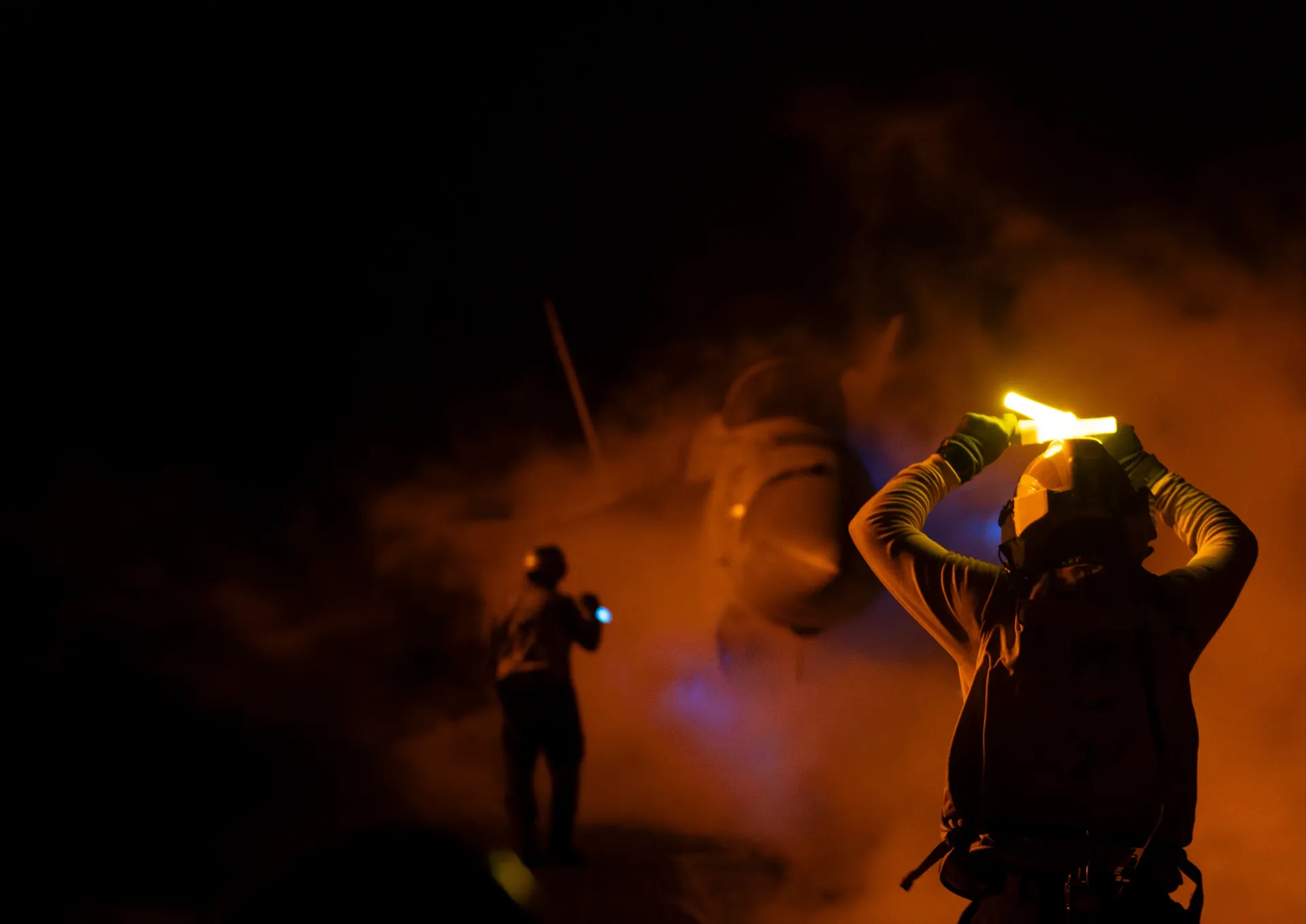 Night landing with helmet visible